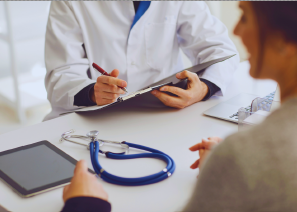 stock image of doctor conversing with patient